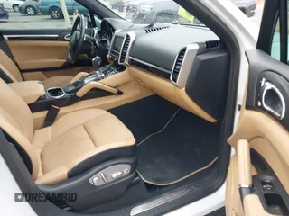 2014 Porsche Cayenne with VIN WP1AA2A27ELA09019, listed as a IAAI auction lot 42068012 with 77,997 mi miles and . Bid and sale history available at DreamBid. Image 5.