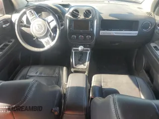 2017 Jeep Compass High Altitude with VIN 1C4NJDEBXHD128299, listed as a Copart auction lot 52846095 with 64,395 mi miles and Salvage Title. Bid and sale history available at DreamBid. Image 8.