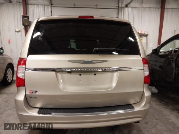 2014 Chrysler Town & Country Touring with VIN 2C4RC1BG3ER295722, listed as a IAAI auction lot 41705820 with 142,587 mi miles and . Bid and sale history available at DreamBid. Image 17.