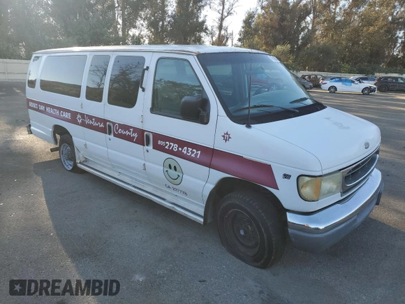 2000 Ford Econoline Passenger XL with VIN 1FBSS31L3YHB98619, listed as a Copart auction lot 77615904 with 316,815 mi miles and Clean Title. Bid and sale history available at DreamBid. Image 4.