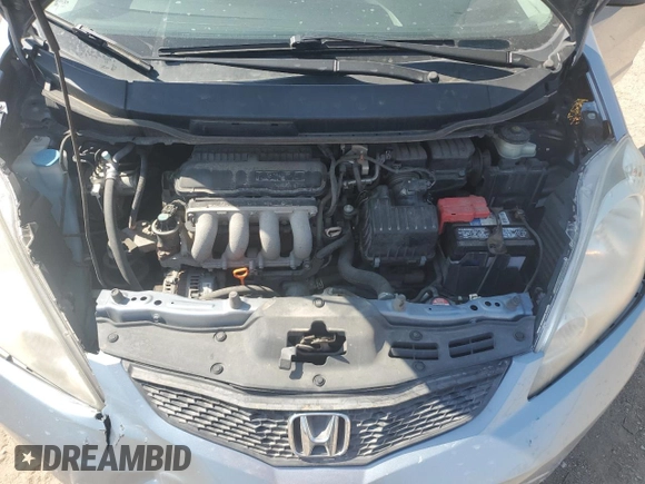 2011 Honda Fit Sport z VIN JHMGE8H53BC021245, wystawiony jako Copart lot #55393345 z przebiegiem 133 910 mil mil oraz Szkody całkowita. Historia ofert i sprzedaży dostępna na DreamBid. Obrazek 11.