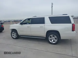 2015 Chevrolet Suburban LTZ with VIN 1GNSCKKC7FR641421, listed as a IAAI auction lot 41637137 with 139,001 mi miles and . Bid and sale history available at DreamBid. Image 14.