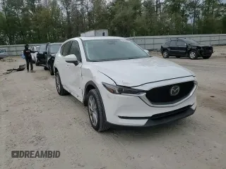 2021 Mazda CX-5 Grand Touring Reserve with VIN JM3KFBAY5M0320404, listed as a Copart auction lot 50405075 with 32,596 mi miles and Salvage Title. Bid and sale history available at carsss.com. Image 10.