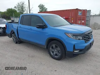 2024 Honda Ridgeline TrailSport with VIN 5FPYK3F68RB022103, listed as a IAAI auction lot 42356129 with 7,986 mi miles and . Bid and sale history available at DreamBid. Image 1.