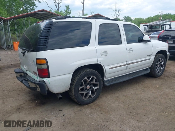 2005 GMC Yukon SLT z VIN 1GKEC13T75R114660, wystawiony jako IAAI lot #42223845 z przebiegiem 199 064 mil mil oraz . Historia ofert i sprzedaży dostępna na DreamBid. Obrazek 4.