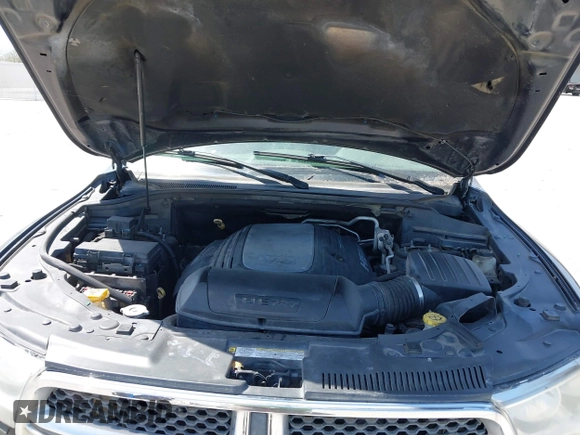 2013 Dodge Durango Crew with VIN 1C4SDHDT5DC637535, listed as a IAAI auction lot 41867982 with 162,569 mi miles and . Bid and sale history available at DreamBid. Image 10.