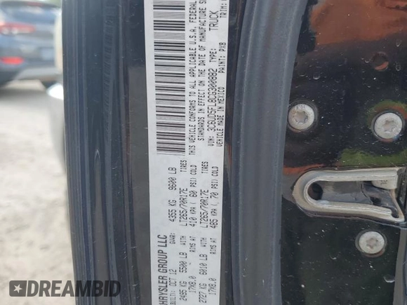 2012 Ram 2500 Laramie z VIN 3C6UD5FL8CG300882, wystawiony jako Copart lot #55700025 z przebiegiem 228 844 mil mil oraz Czysty tytuł • Clean title. Historia ofert i sprzedaży dostępna na DreamBid. Obrazek 12.