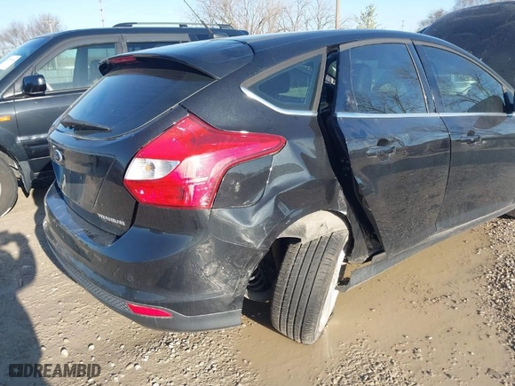 2012 Ford Focus Titanium with VIN 1FAHP3N21CL354550, listed as a IAAI auction lot 41815693 with NaN miles. Bid and sale history available at carsss.com. Image 6.