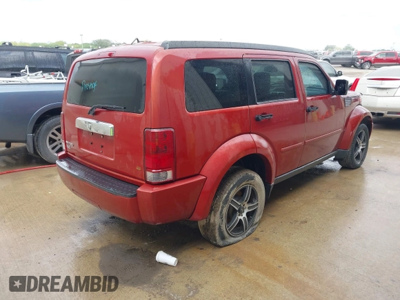 2007 Dodge Nitro SLT with VIN 1D8GT58K77W640112, listed as a IAAI auction lot 42015613 with 220,061 mi miles. Bid and sale history available at carsss.com. Image 4.