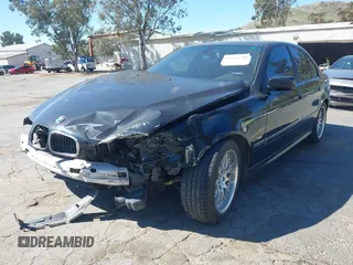 2001 BMW 5 Series 530iA with VIN WBADT63421CF01580, listed as a IAAI auction lot 41626798 with 146,647 mi miles. Bid and sale history available at carsss.com. Image 2.