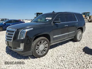 2018 Cadillac Escalade Platinum z VIN 1GYS4DKJXJR220277, wystawiony jako Copart lot #48487265 z przebiegiem 96 642 mil mil oraz Czysty tytuł • Clean title. Historia ofert i sprzedaży dostępna na DreamBid. Obrazek 1.