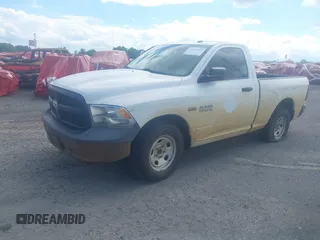 2015 Ram 1500 Tradesman with VIN 3C6JR6AT1FG574429, listed as a IAAI auction lot 42034590 with 242,093 mi miles and . Bid and sale history available at DreamBid. Image 2.