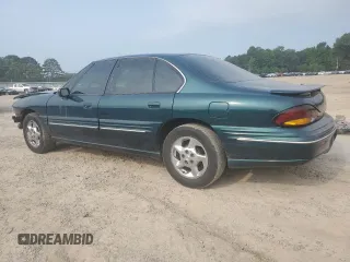 1999 Pontiac Bonneville SE z VIN 1G2HX52K7XH244741, wystawiony jako Copart lot #59304715 z przebiegiem 116 273 mil mil oraz Szkoda całkowita • Salvage title. Historia ofert i sprzedaży dostępna na DreamBid. Obrazek 2.