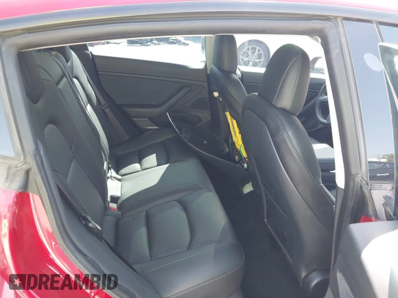 2021 Tesla Model 3 Long Range with VIN 5YJ3E1EB4MF936743, listed as a IAAI auction lot 42154322 with 46,983 mi miles and . Bid and sale history available at DreamBid. Image 8.