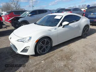2015 Scion FR-S with VIN JF1ZNAA13F8707454, listed as a IAAI auction lot 41239233 with 130,126 mi miles. Bid and sale history available at carsss.com. Image 16.