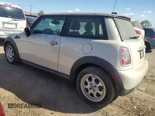 2013 MINI Hardtop with VIN WMWSU3C56DT688738, listed as a Copart auction lot 76593004 with 107,253 mi miles and Clean Title. Bid and sale history available at DreamBid. Image 2.