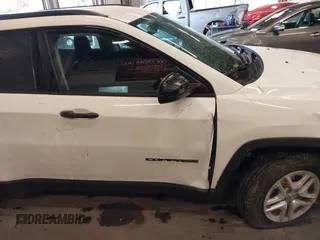 2018 Jeep Compass Sport with VIN 3C4NJCAB6JT124198, listed as a IAAI auction lot 41192196 with 104,557 mi miles. Bid and sale history available at carsss.com. Image 21.