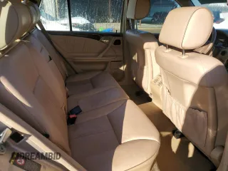 2000 Mercedes-Benz E-Class with VIN WDBJH65J6YB012332, listed as a Copart auction lot 80918284 with 186,616 mi miles and Clean Title. Bid and sale history available at carsss.com. Image 10.