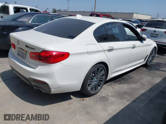 2018 BMW 5 Series 530i with VIN WBAJA5C5XJWA39179, listed as a IAAI auction lot 42380945 with 76,410 mi miles and . Bid and sale history available at DreamBid. Image 4.