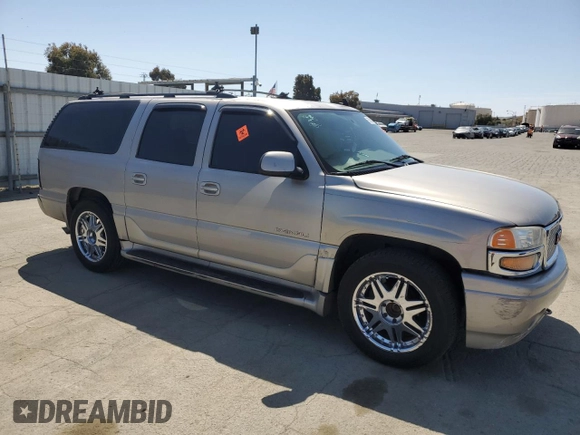 2006 GMC Yukon XL with VIN 1GKFK66U36J134459, listed as a Copart auction lot 55802165 with 277,366 mi miles and Salvage title. Bid and sale history available at DreamBid. Image 4.