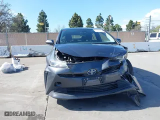2022 Toyota Prius L Eco with VIN JTDKAMFU4N3177258, listed as a IAAI auction lot 39148811 with 50,902 mi miles. Bid and sale history available at carsss.com. Image 6.