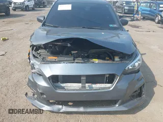 2018 Subaru Impreza with VIN 4S3GTAA63J3748319, listed as a IAAI auction lot 42441310 with 71,616 mi miles and . Bid and sale history available at DreamBid. Image 6.