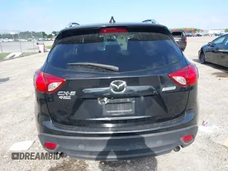2014 Mazda CX-5 Touring with VIN JM3KE2CYXE0384987, listed as a IAAI auction lot 42052196 with 151,765 mi miles. Bid and sale history available at carsss.com. Image 16.