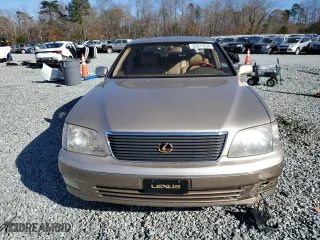 1999 Lexus LS 400 Luxury Sdn with VIN JT8BH28F8X0154051, listed as a Copart auction lot 83015204 with 196,727 mi miles and Salvage Title. Bid and sale history available at carsss.com. Image 5.