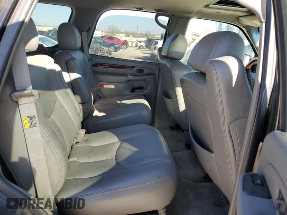 2003 Cadillac Escalade z VIN 1GYEC63T63R317510, wystawiony jako Copart lot #48515195 z przebiegiem 398 303 mil mil oraz Czysty tytuł • Clean title. Historia ofert i sprzedaży dostępna na DreamBid. Obrazek 11.