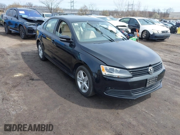 2012 Volkswagen Jetta Sedan TDI w/Premium & Nav with VIN 3VWLL7AJXCM026589, listed as a IAAI auction lot 41870945 with 72,544 mi miles. Bid and sale history available at carsss.com. Image 1.