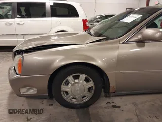 2004 Cadillac DeVille z VIN 1G6KD54Y04U119341, wystawiony jako IAAI lot #42193664 z przebiegiem 162 290 mil mil oraz . Historia ofert i sprzedaży dostępna na DreamBid. Obrazek 18.