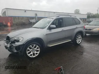 2011 BMW X5 35i z VIN 5UXZV4C58BL402212, wystawiony jako Copart lot #57893995 z przebiegiem Nie podano mil oraz Szkoda całkowita • Salvage title. Historia ofert i sprzedaży dostępna na DreamBid. Obrazek 1.