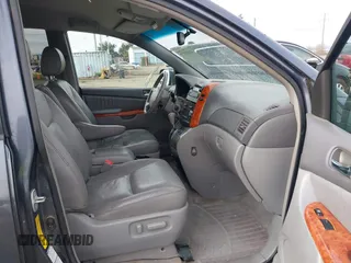 2008 Toyota Sienna XLE with VIN 5TDBK22C98S017300, listed as a IAAI auction lot 41433777 with 248,602 mi miles. Bid and sale history available at carsss.com. Image 5.