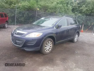 2010 Mazda CX-9 Sport with VIN JM3TB3MVXA0217305, listed as a IAAI auction lot 42188795 with 131,875 mi miles and . Bid and sale history available at DreamBid. Image 2.