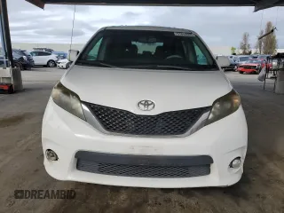 2012 Toyota Sienna SE with VIN 5TDXK3DC9CS215991, listed as a Copart auction lot 51868005 with 215,075 mi miles and Salvage title. Bid and sale history available at DreamBid. Image 5.