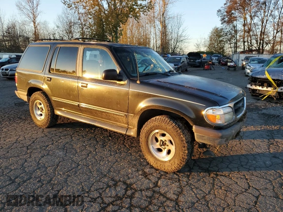 1997 Ford Explorer XL with VIN 1FMDU34E8VUC95969, listed as a Copart auction lot 83269784 with 174,035 mi miles and Salvage title. Bid and sale history available at DreamBid. Image 4.