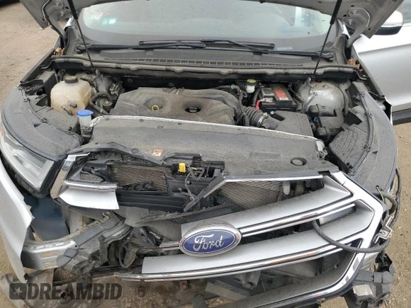 2015 Ford Edge Titanium z VIN 2FMTK4K9XFBB56155, wystawiony jako Copart lot #56735555 z przebiegiem 86 167 mil mil oraz Szkoda całkowita • Salvage title. Historia ofert i sprzedaży dostępna na DreamBid. Obrazek 11.