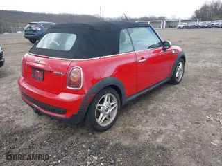 2010 MINI Cooper Convertible S with VIN WMWMS3C58ATY09229, listed as a IAAI auction lot 42055305 with 142,396 mi miles. Bid and sale history available at carsss.com. Image 4.