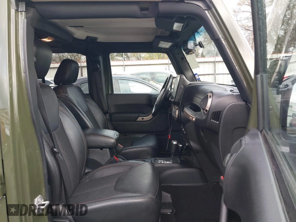 2016 Jeep Wrangler Unlimited Sahara with VIN 1C4BJWEGXGL249638, listed as a IAAI auction lot 41090024 with 98,345 mi miles and . Bid and sale history available at DreamBid. Image 5.
