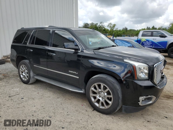 2015 GMC Yukon Denali with VIN 1GKS1CKJ0FR140877, listed as a Copart auction lot 50917985 with 180,726 mi miles and Salvage Title. Bid and sale history available at carsss.com. Image 4.
