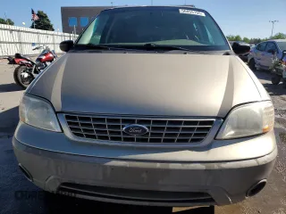 2001 Ford Windstar z VIN 2FMZA554X1BB51324, wystawiony jako Copart lot #56855195 z przebiegiem 156 324 mil mil oraz Szkody całkowita. Historia ofert i sprzedaży dostępna na DreamBid. Obrazek 5.