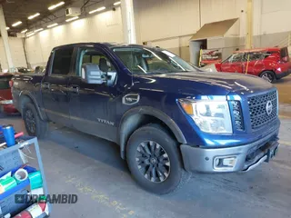 2017 Nissan Titan SL z VIN 1N6AA1E58HN570321, wystawiony jako IAAI lot #41424893 z przebiegiem 151 294 mil mil oraz . Historia ofert i sprzedaży dostępna na DreamBid. Obrazek 1.