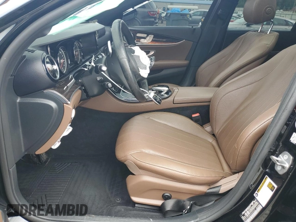 2017 Mercedes-Benz E 300 Luxury with VIN WDDZF4KB5HA045524, listed as a Copart auction lot 58699695 with 52,611 mi miles and Salvage title. Bid and sale history available at DreamBid. Image 7.