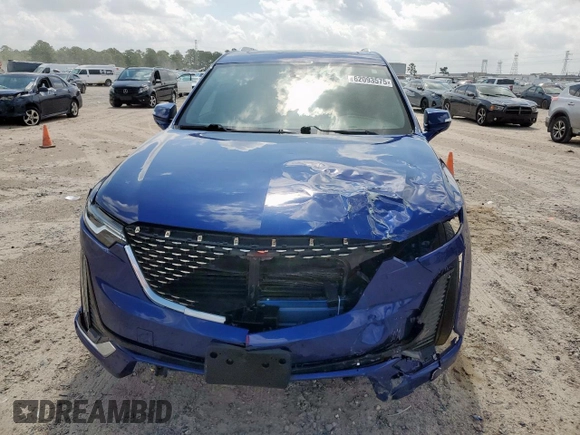 2023 Cadillac XT6 FWD Luxury с VIN 1GYKPAR42PZ167668, выставлен на аукционе Copart как лот 62093575 с пробегом 32 212 миль миль и Списание • Salvage title. История ставок и продаж доступна на DreamBid. Изображение 5.