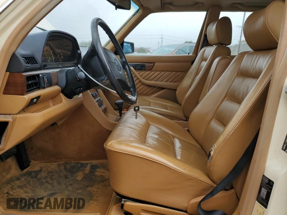 1989 Mercedes-Benz 300 with VIN WDBCA24D2KA430787, listed as a Copart auction lot 50655785 with 145,064 mi miles and Salvage Title. Bid and sale history available at DreamBid. Image 7.