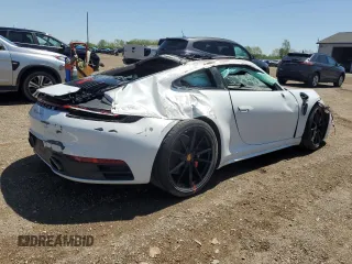 2020 Porsche 911 Carrera S z VIN WP0AB2A91LS225947, wystawiony jako Copart lot #57143425 z przebiegiem Nie podano mil oraz Tytuł czysty. Historia ofert i sprzedaży dostępna na DreamBid. Obrazek 3.
