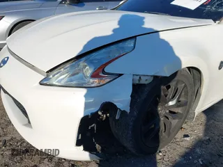 2015 Nissan 370Z Sport with VIN JN1AZ4EH0FM440627, listed as a IAAI auction lot 41410844 with 99,420 mi miles. Bid and sale history available at carsss.com. Image 6.
