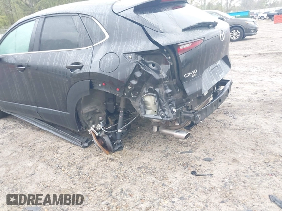 2020 Mazda CX-30 Select with VIN 3MVDMBCL3LM104988, listed as a IAAI auction lot 41951565 with 53,685 mi miles and . Bid and sale history available at DreamBid. Image 6.