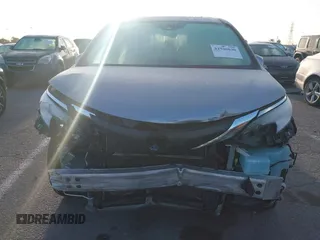 2021 Toyota Sienna XLE with VIN 5TDYRKEC2MS074448, listed as a IAAI auction lot 41946030 with 122,509 mi miles and . Bid and sale history available at DreamBid. Image 6.