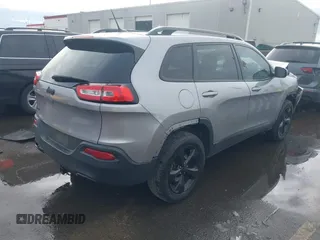 2018 Jeep Cherokee Latitude with VIN 1C4PJMCX4JD548136, listed as a IAAI auction lot 41592821 with 165,022 mi miles and . Bid and sale history available at DreamBid. Image 4.